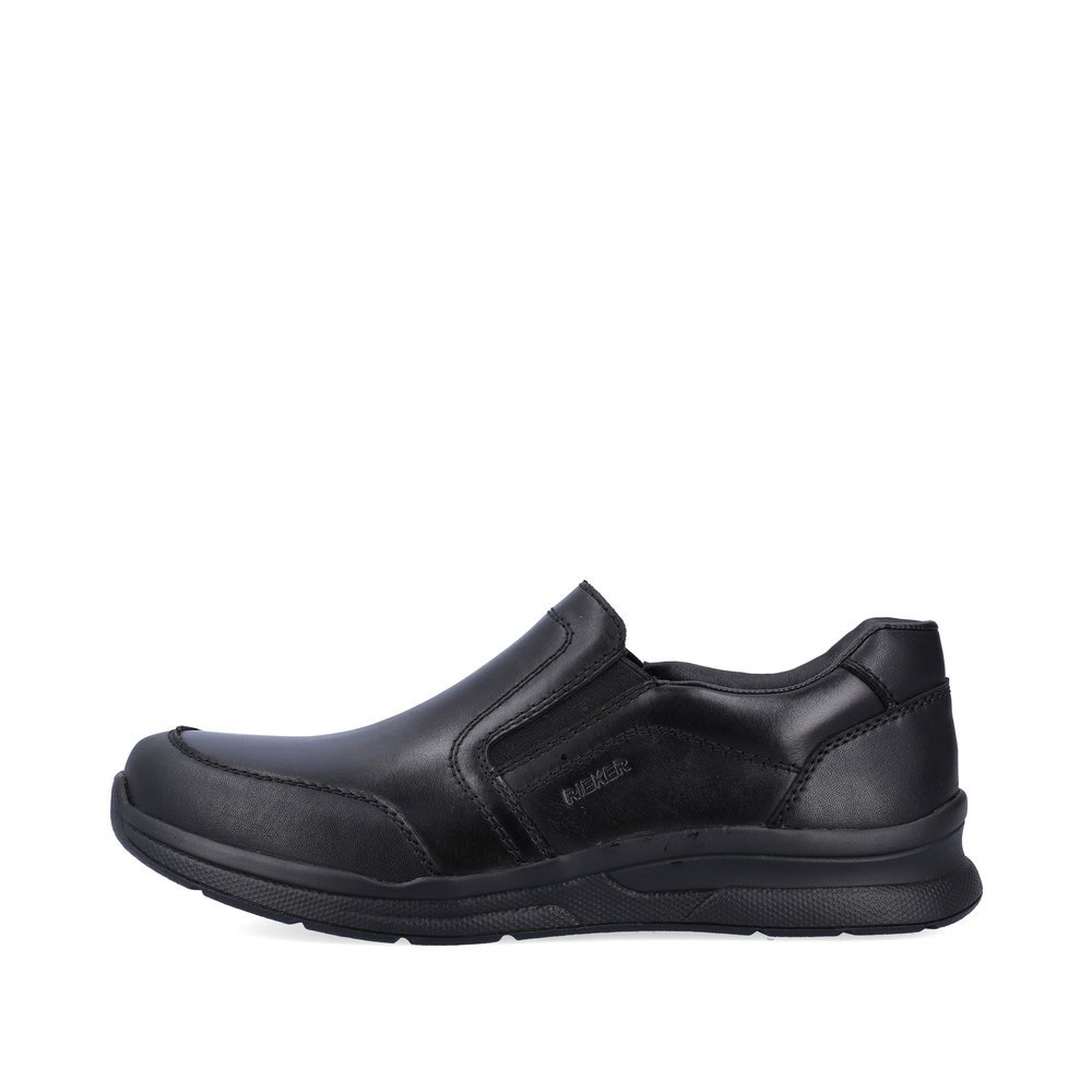 Black Rieker men´s slippers 14850-01 with elastic insert as well as extra width H. Outside of the shoe.