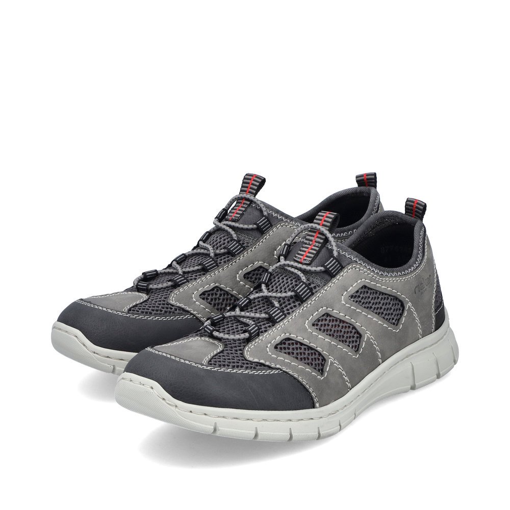 Grey Rieker men´s slippers B7762-45 with elastic lacing as well as white stitching. Shoes laterally.