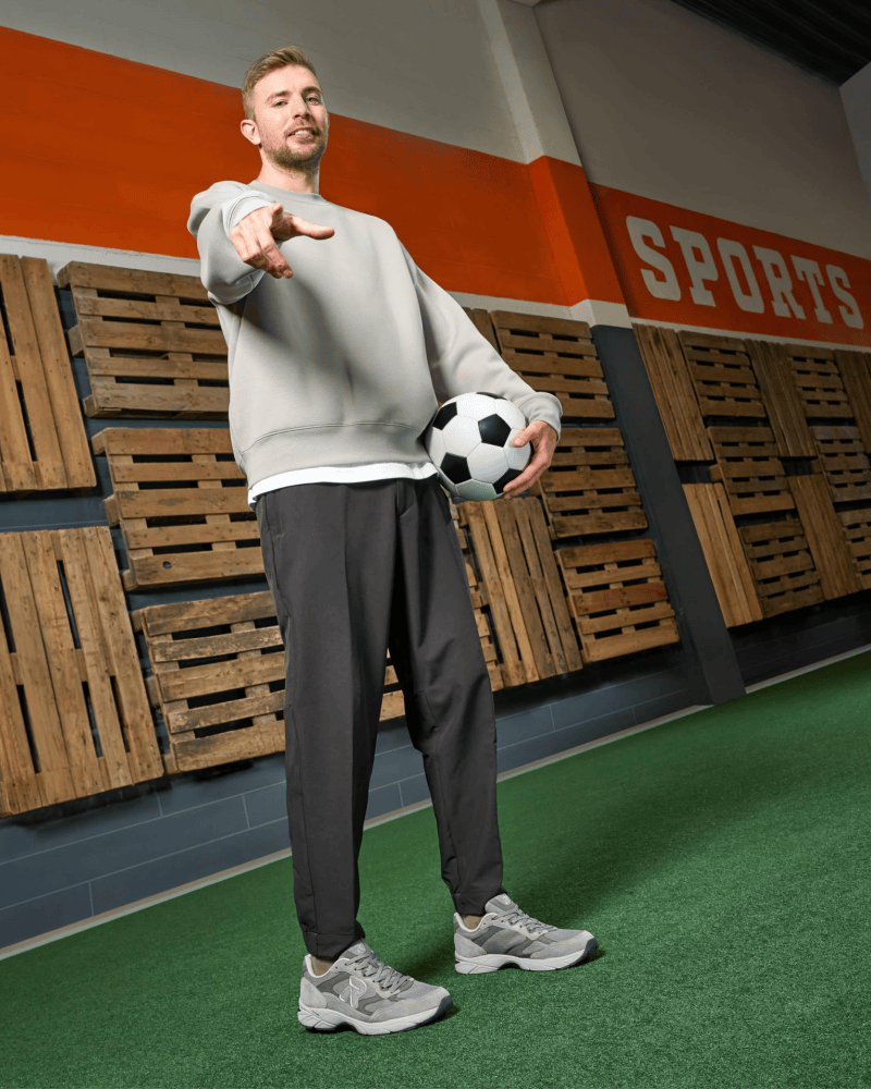 Christoph Kramer with football under hier arm and rieker shoes