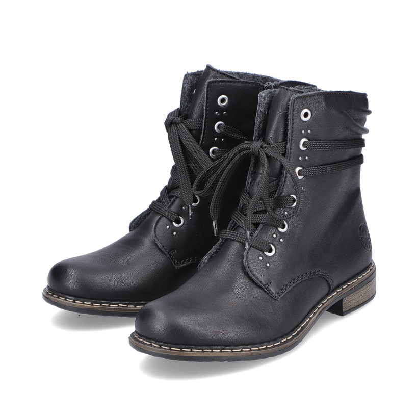 Bottes à lacets Rieker noires pour femme 71218-00 avec fermeture éclair. Chaussures inclinées sur le côté.