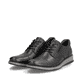 Schwarze Rieker Herren Slipper 14701-00 mit Schnürung sowie Komfortweite G 1/2. Schuhpaar seitlich schräg.