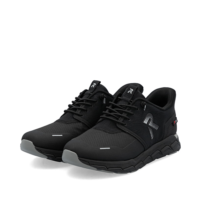 Baskets basses Rieker noires pour femme M9051-00 avec membrane RiekerTEX. Chaussures inclinées sur le côté.
