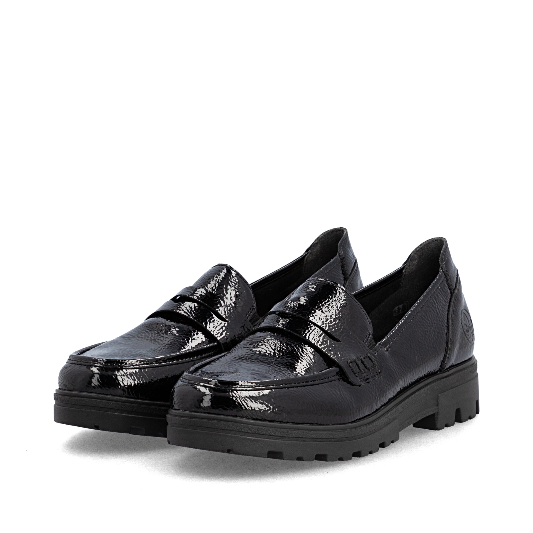 Mocassins Rieker noirs pour femmes 43050-00 avec bande élastique. Chaussures inclinées sur le côté.