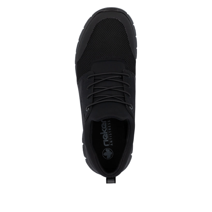 Schwarze Rieker Herren Slipper B6650-00 mit Gummizug sowie Komfortweite G 1/2. Schuh von oben.