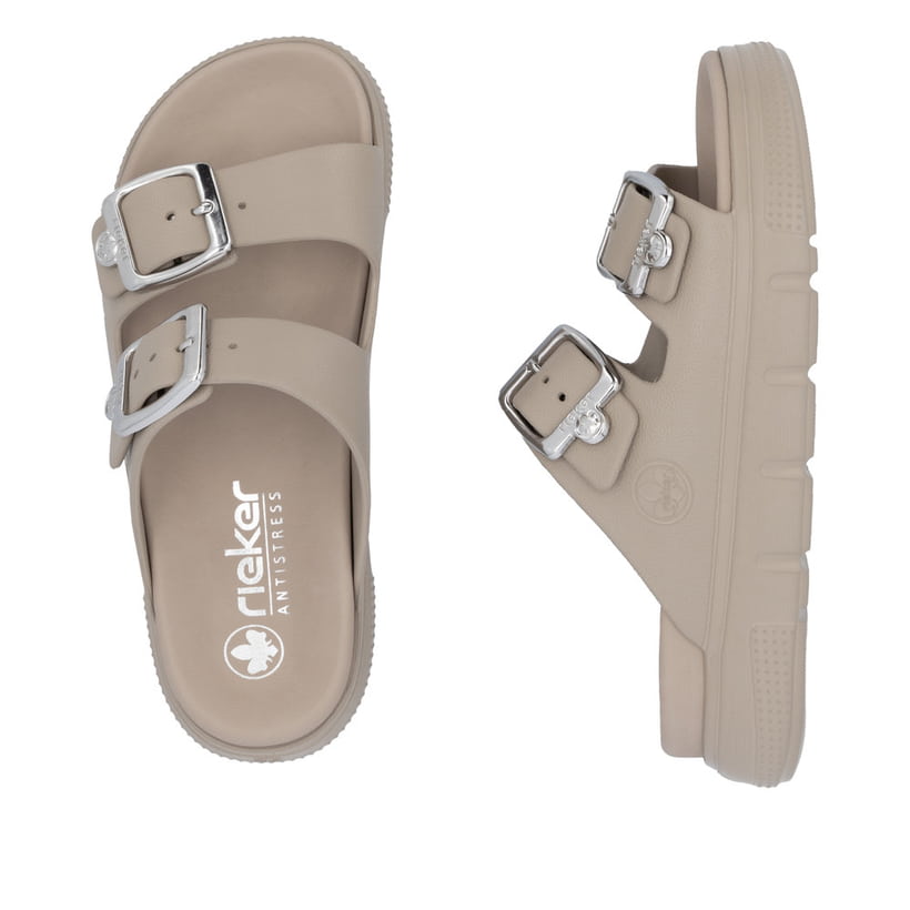 Beige Rieker Damen Pantoletten P2180-60 mit Schnallen sowie ultraleichter Sohle. Schuh von oben, liegend.
