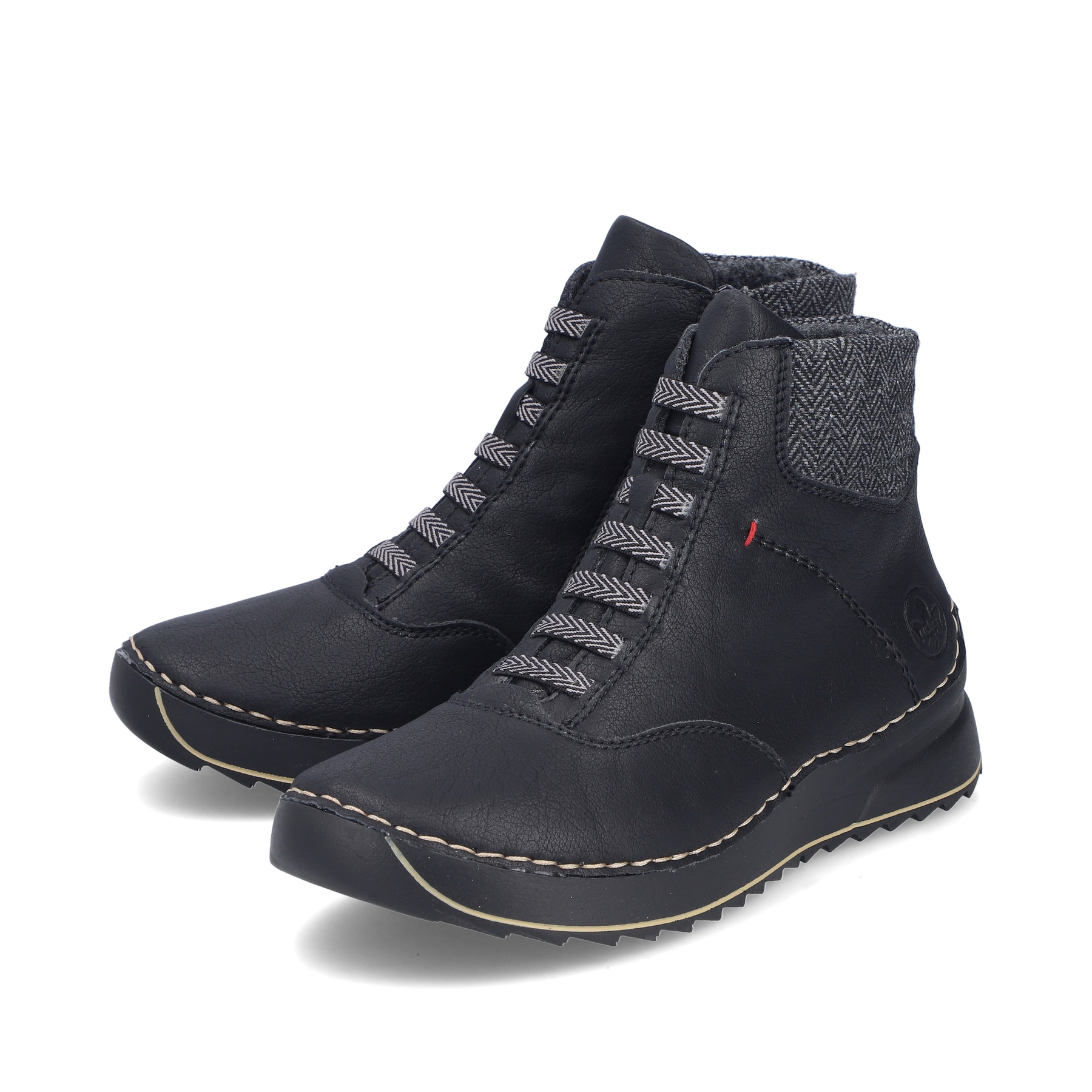 Schwarze Rieker Damen Schnürstiefel 51553-00 mit einem Reißverschluss. Schuhpaar seitlich schräg.