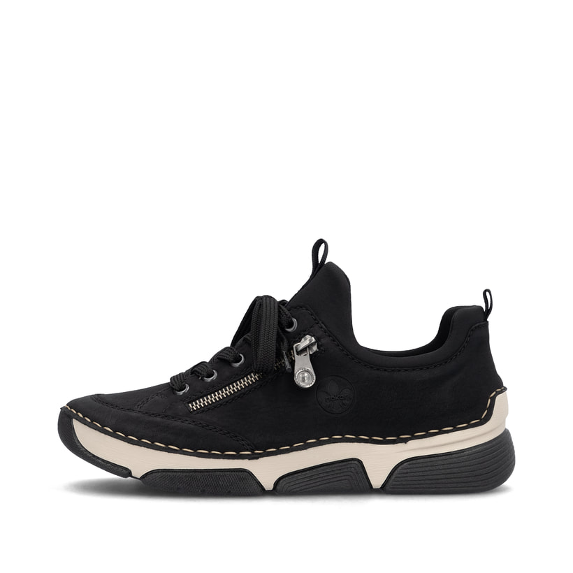 Mocassins Rieker noirs pour femme 45973-00 avec bande élastique. Côté extérieur de la chaussure.