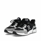 Mocassins Rieker noirs pour homme U1405-00 avec bande élastique. Chaussures inclinées sur le côté.