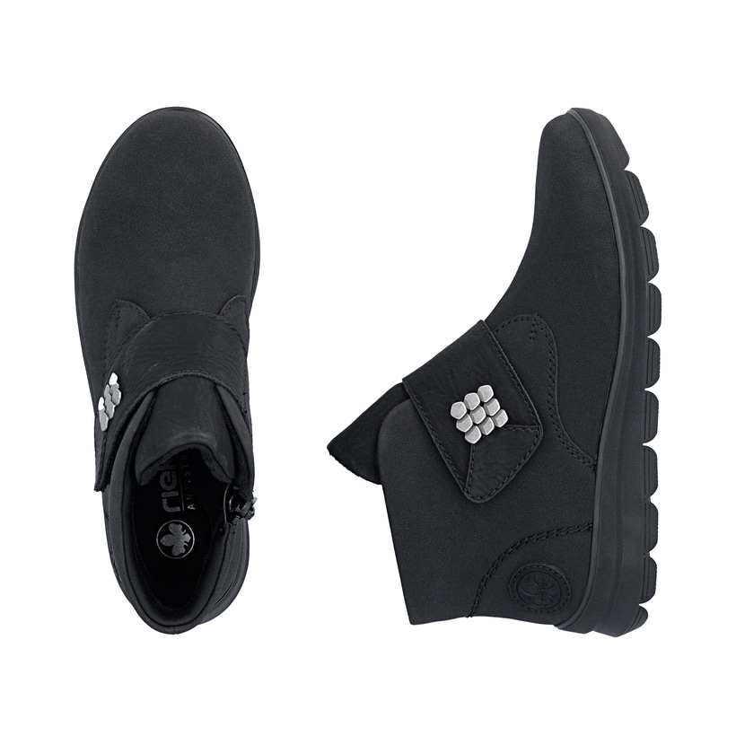 Bottines Rieker noires pour femmes Z0064-00 avec éléments décoratifs. Chaussure vue de dessus, couchée.