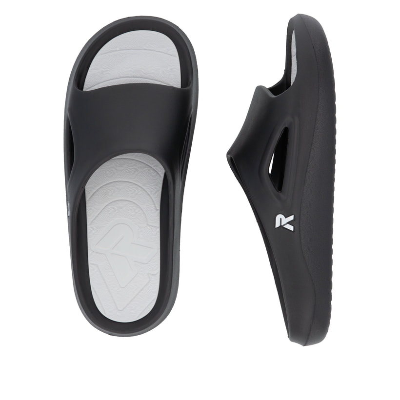 Schwarze Rieker Herren Pantoletten U3450-00 mit einer ultraleichten Sohle. Schuh von oben, liegend.