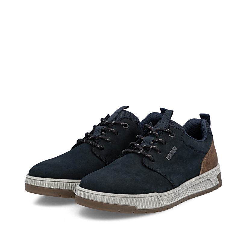 Dunkelblaue Rieker Herren Sneaker Low 36005-14 aus Rauleder. Schuhpaar seitlich schräg.