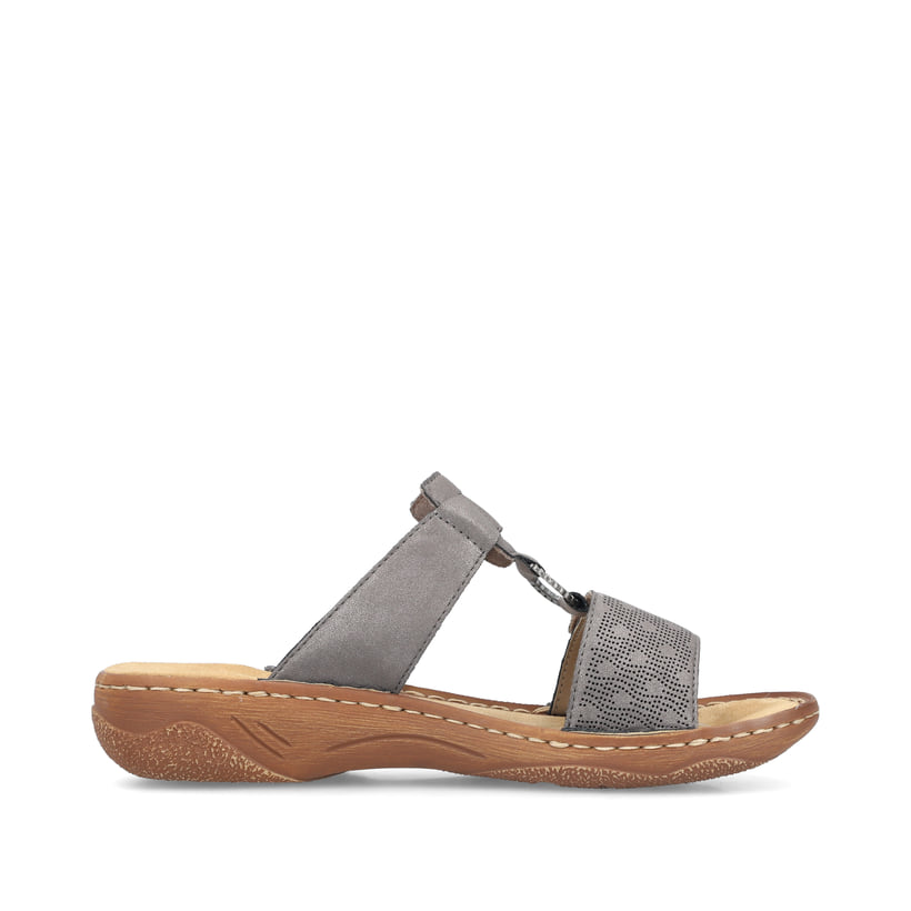 Graue Rieker Damen Pantoletten V2885-42 in Löcheroptik mit einem Klettverschluss. Schuh Innenseite.