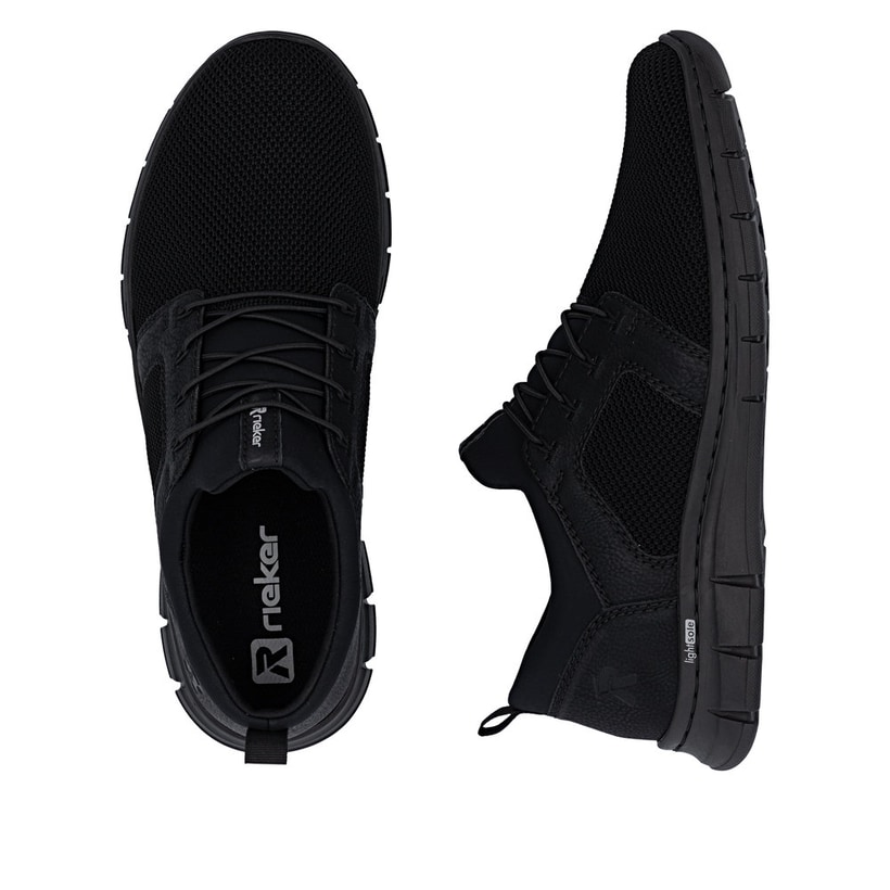 Mocassins Rieker noirs pour homme B7796-01 avec bande élastique. Chaussure vue de dessus, couchée.