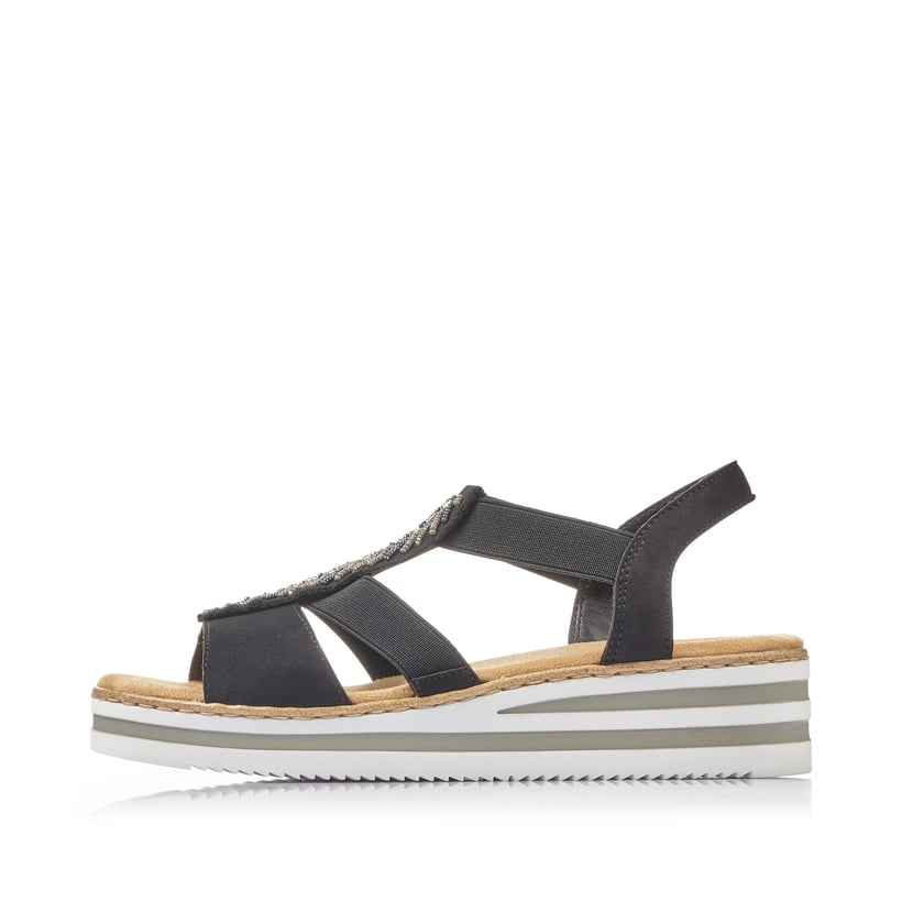Tiefschwarze Rieker Keilsandaletten V02C1-00 mit einem Elastikeinsatz. Schuh Außenseite.