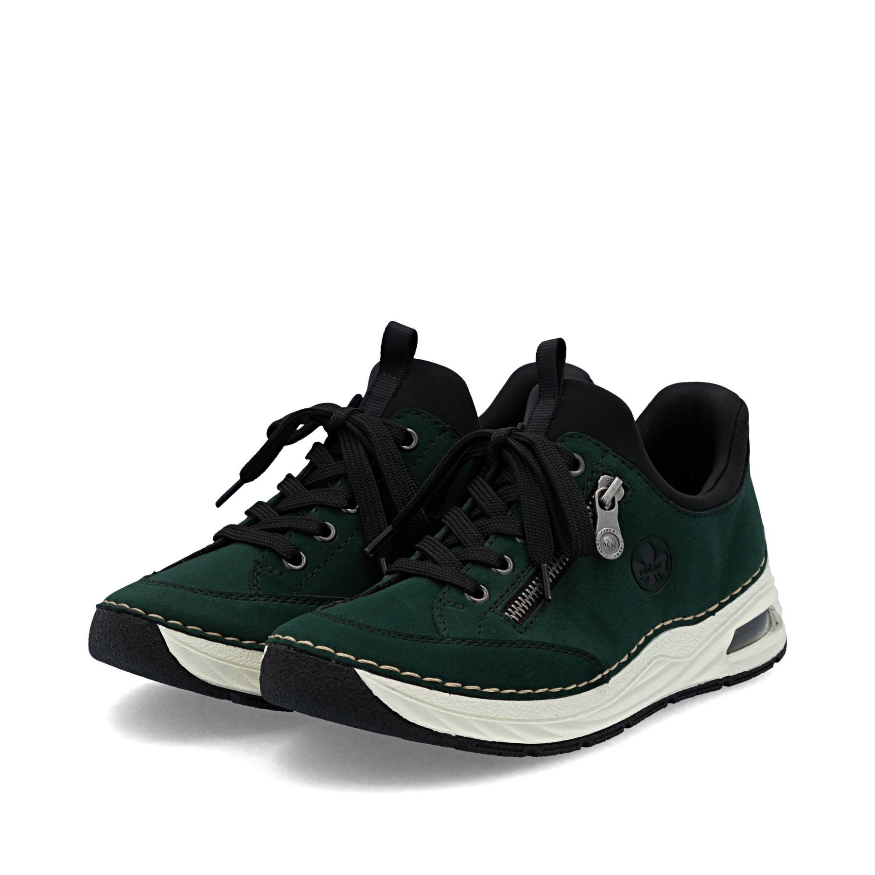 Dunkelgrüne Rieker Damen Slipper 44567-54 mit Rieker Air Sohlenfenster. Schuhpaar seitlich schräg.