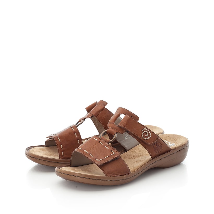 Braune Rieker Damen Pantoletten 60822-24 mit Klettverschluss sowie Ziernähten. Schuh Außenseite gespiegelt.