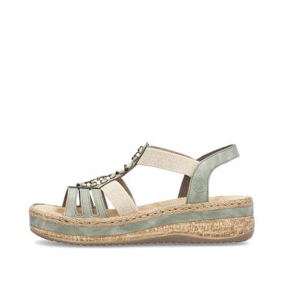 Grüne Rieker Keilsandaletten V0920-52 mit Schmuckelementen sowie einem Gummizug. Schuh Außenseite.