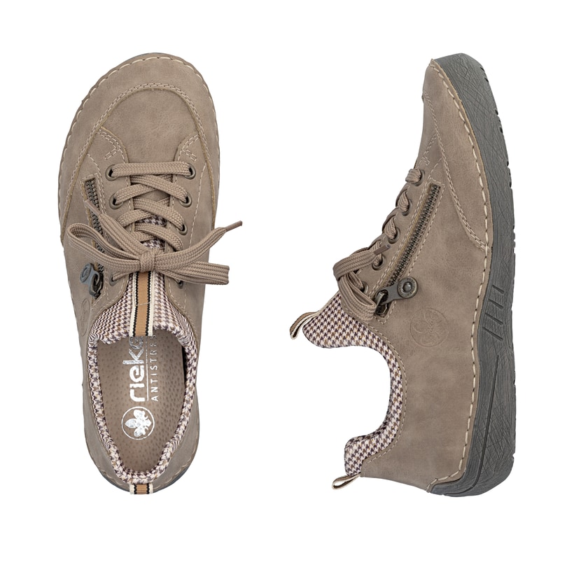 Beige-schwarze Rieker Damen Slipper 52573-64 mit Deko-Reißverschluss. Schuh von oben, liegend.