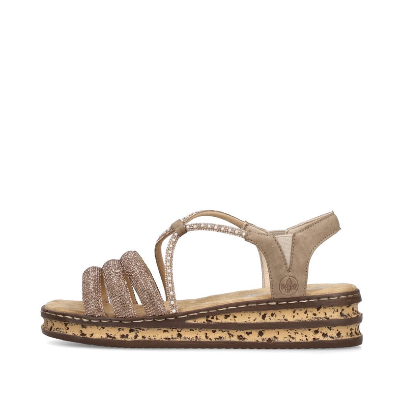 Braune Rieker Keilsandaletten 62977-90 mit Strasssteinen sowie einem Gummizug. Schuh Außenseite.
