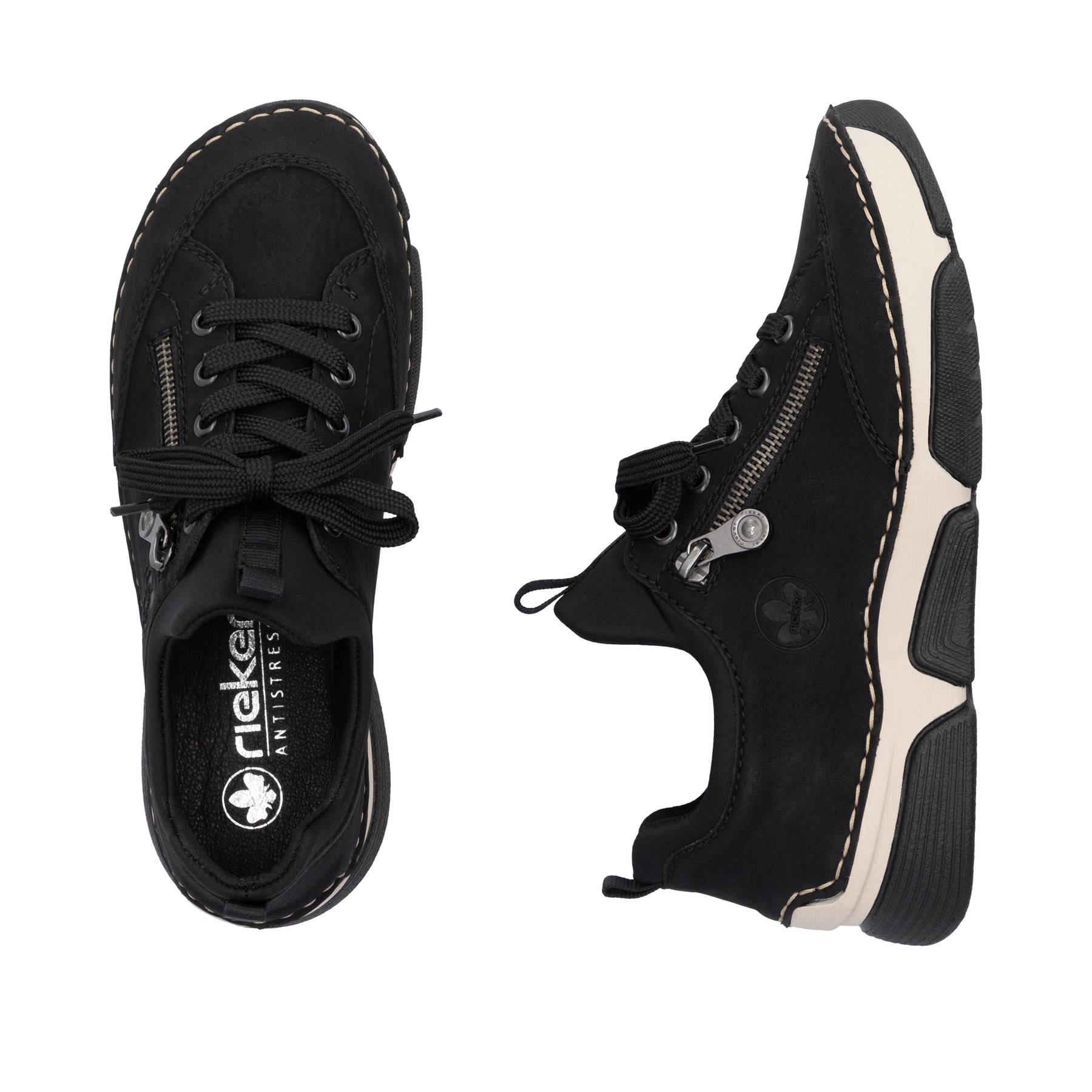 Mocassins Rieker noirs pour femme 45973-00 avec bande élastique. Chaussure vue de dessus, couchée.