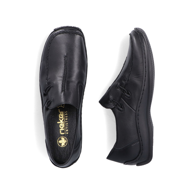 Schwarze Rieker Damen Slipper L1751-00 mit einem Gummizug. Schuh von oben, liegend.