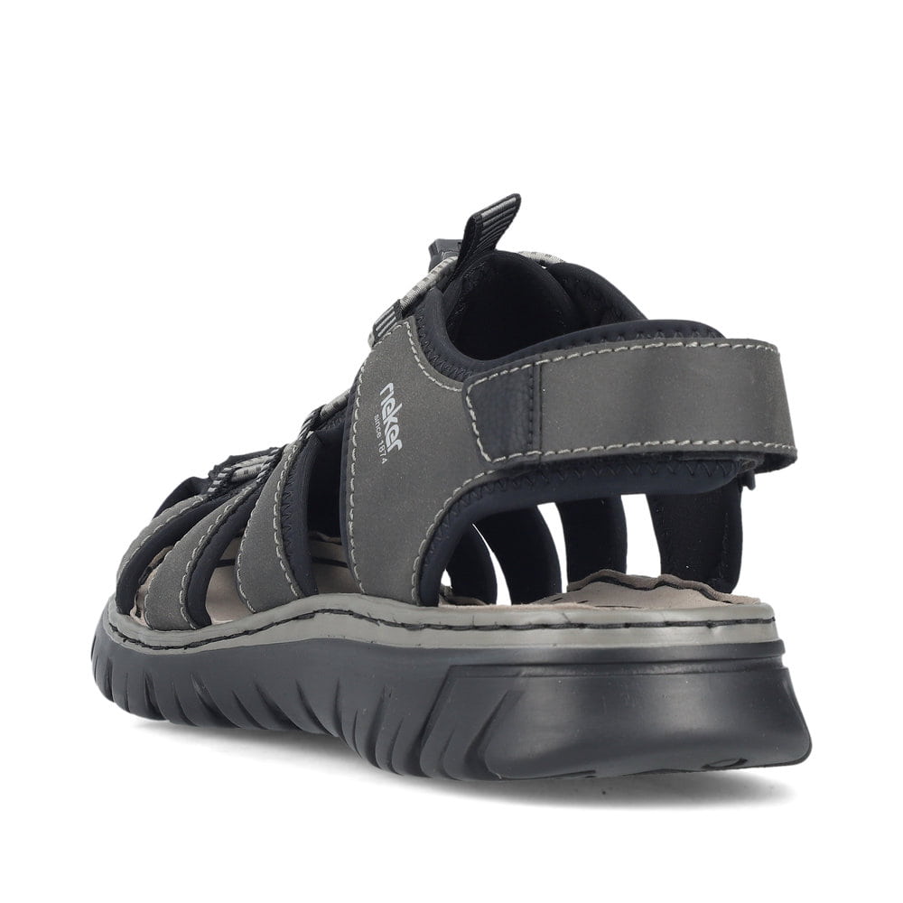 Schwarze Rieker Herren Trekkingsandalen 26770-00 mit einem Klettverschluss. Schuh von hinten.