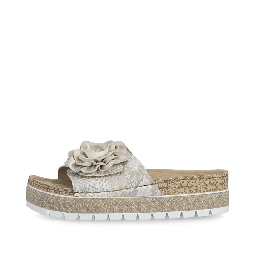Mules Rieker dorées pour femme 69562-90 avec fleur décorative. Côté extérieur de la chaussure.