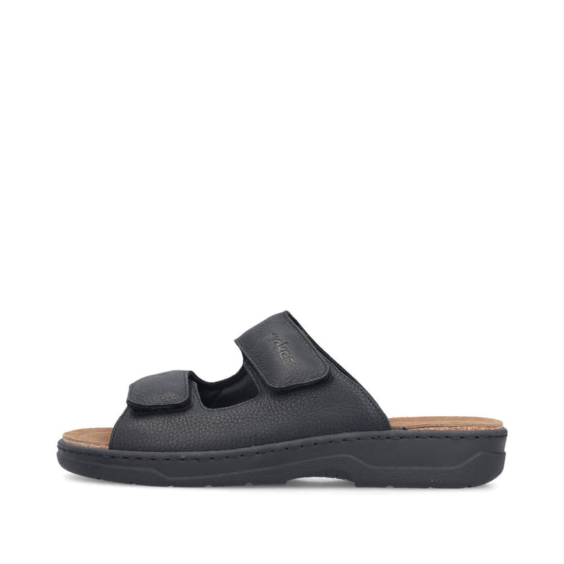 Schwarze Rieker Herren Pantoletten 20390-00 aus Glattleder mit Klettverschluss. Schuh Außenseite.