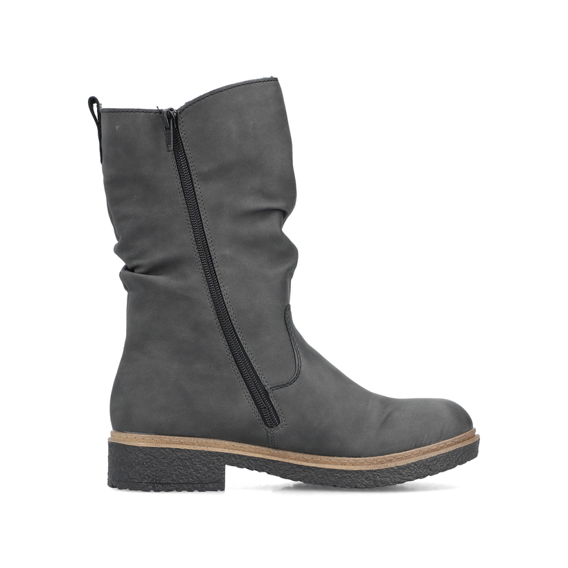 
Sandbeige Rieker Damen Chelsea Boots Z4994-60 mit einer schockabsorbierenden Sohle. Schuh seitlich schräg