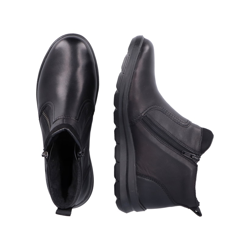 Schwarze Rieker Damen Kurzstiefel Z0060-00 aus Glattleder mit Reißverschluss. Schuh von oben, liegend.