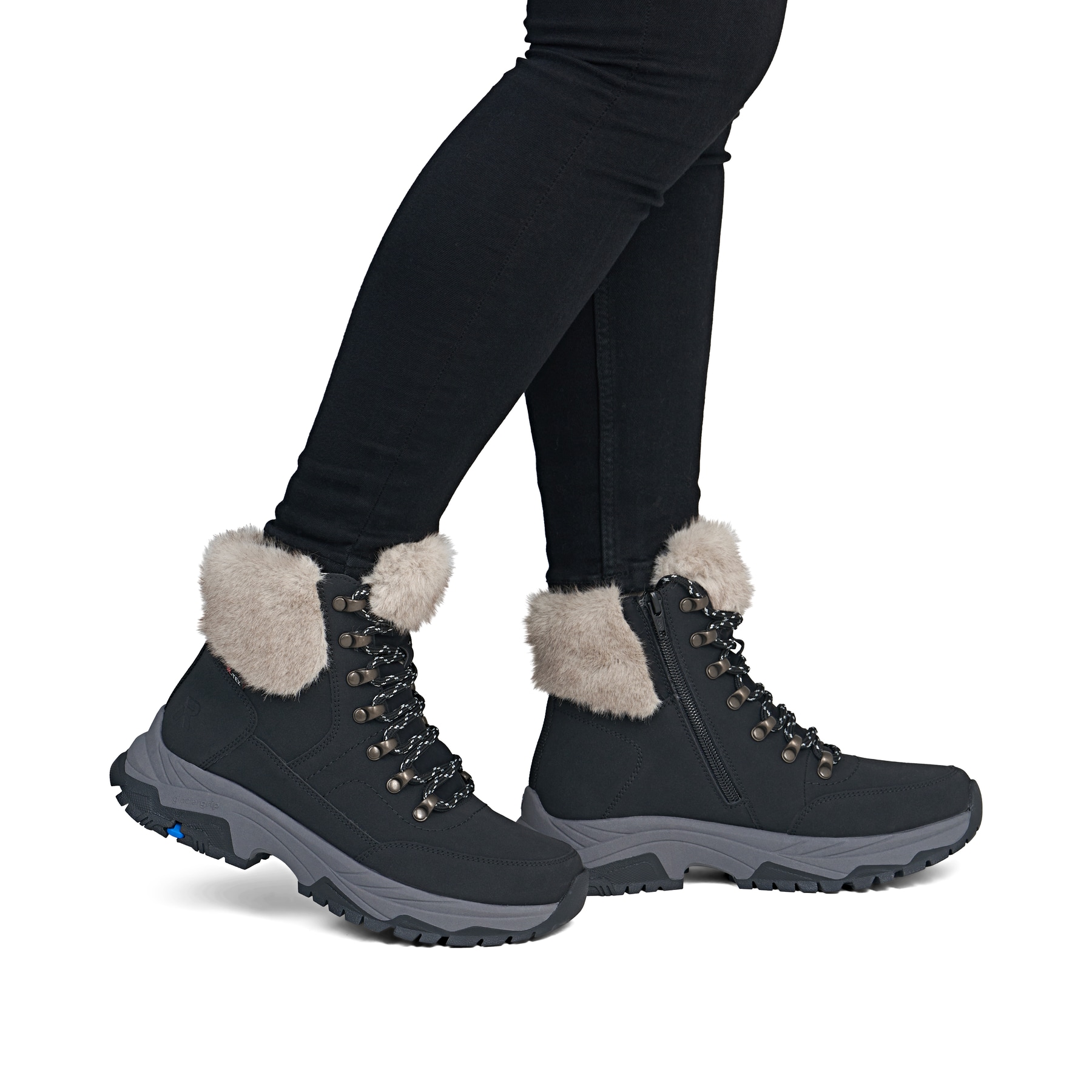 Schwarz-beige Rieker Damen Schnürstiefel Z3971-00 aus Rauleder mit Glacier Grip. Schuh am Fuß.