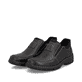 Mocassins Rieker noirs pour hommes 19961-03 avec bande élastique. Chaussures inclinées sur le côté.