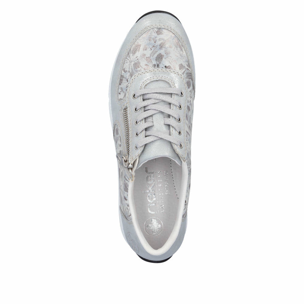 Baskets basses Rieker blanches pour femme N1112-80 avec motif floral. Chaussure vue de dessus.