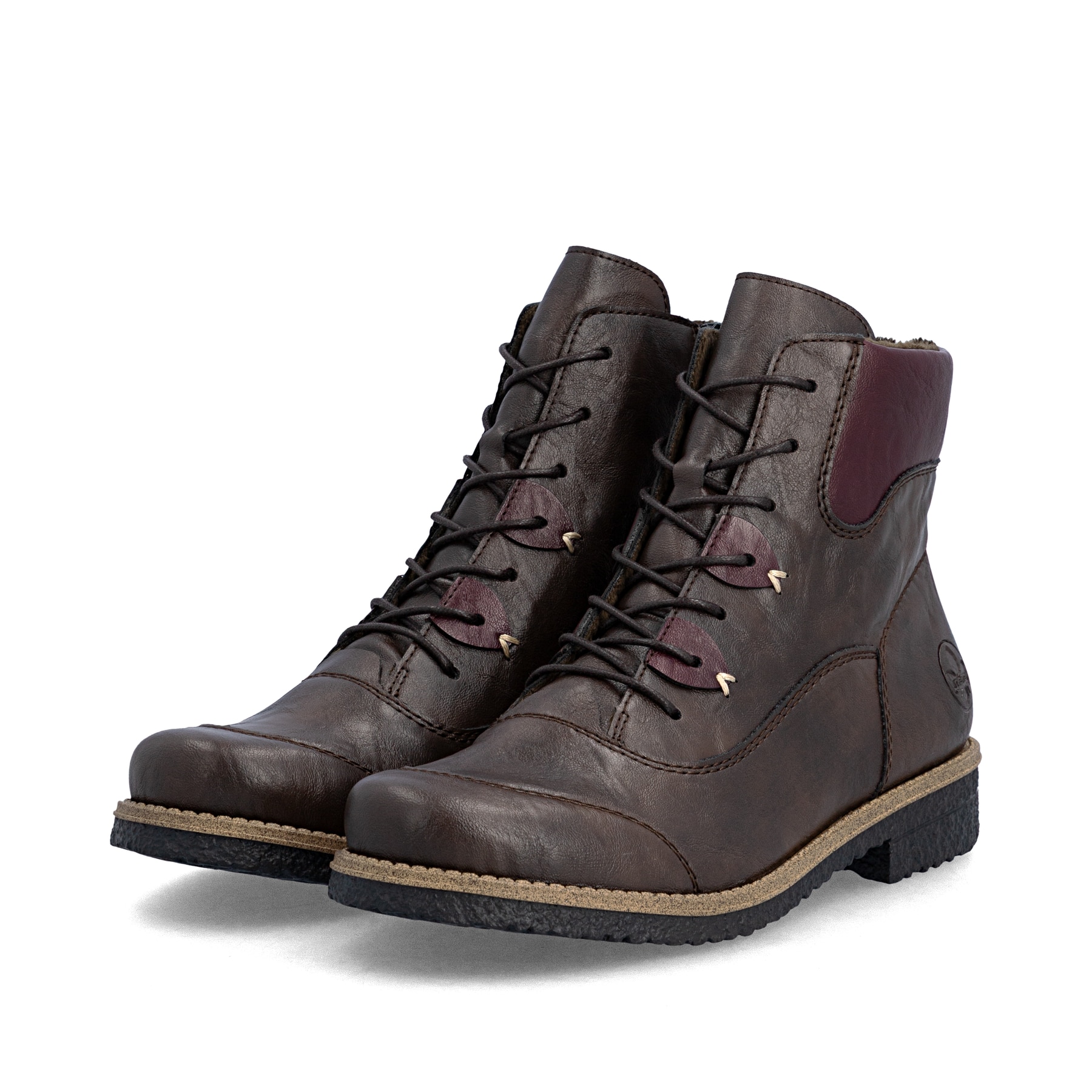 Dunkelbraune Rieker Damen Schnürstiefel 73510-26 mit einem Reißverschluss. Schuhpaar seitlich schräg.