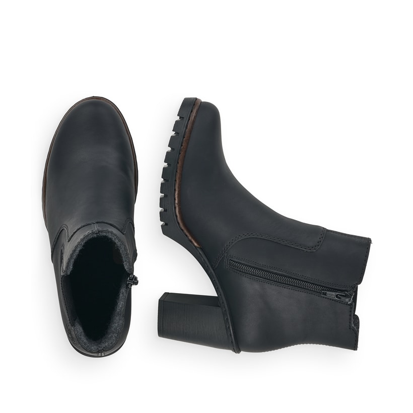 Schwarze Rieker Damen Stiefeletten Y2574-00 mit einem Reißverschluss. Schuh von oben, liegend.