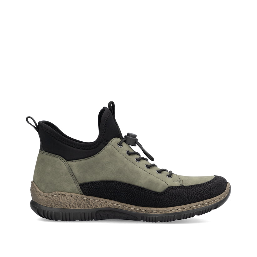 Kaktusgrüne Rieker Damen Slipper N32G3-54 mit einer Gummischnürung. Schuh Innenseite.