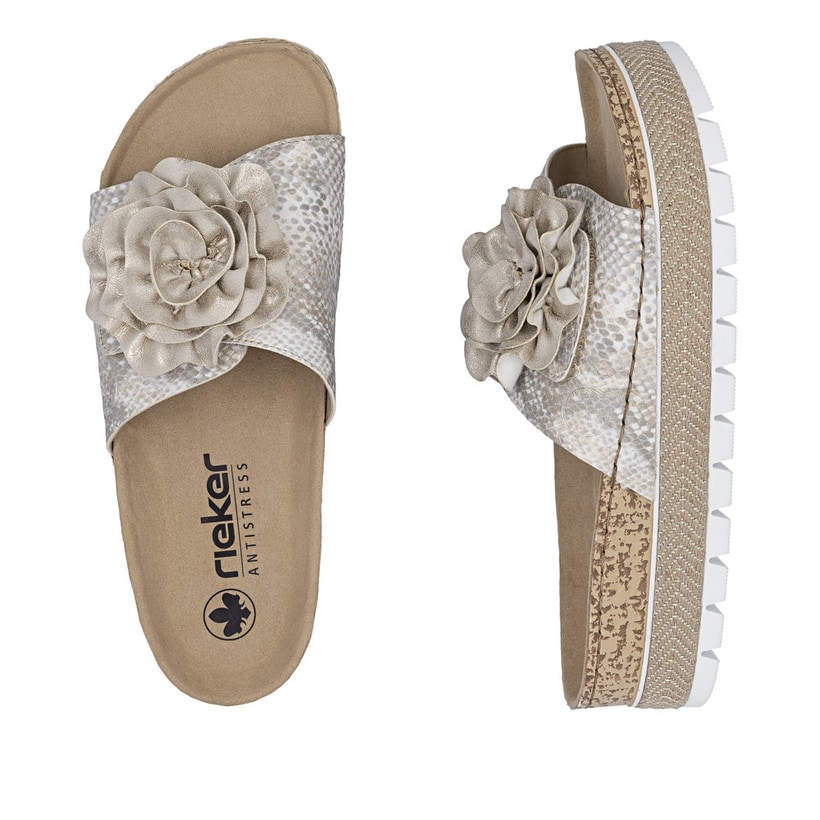 Mules Rieker dorées pour femme 69562-90 avec fleur décorative. Chaussure vue de dessus, couchée.