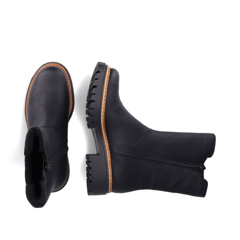 Schwarze Rieker Damen Chelsea Boots 72683-00 mit brauner Naht. Schuh von oben, liegend.