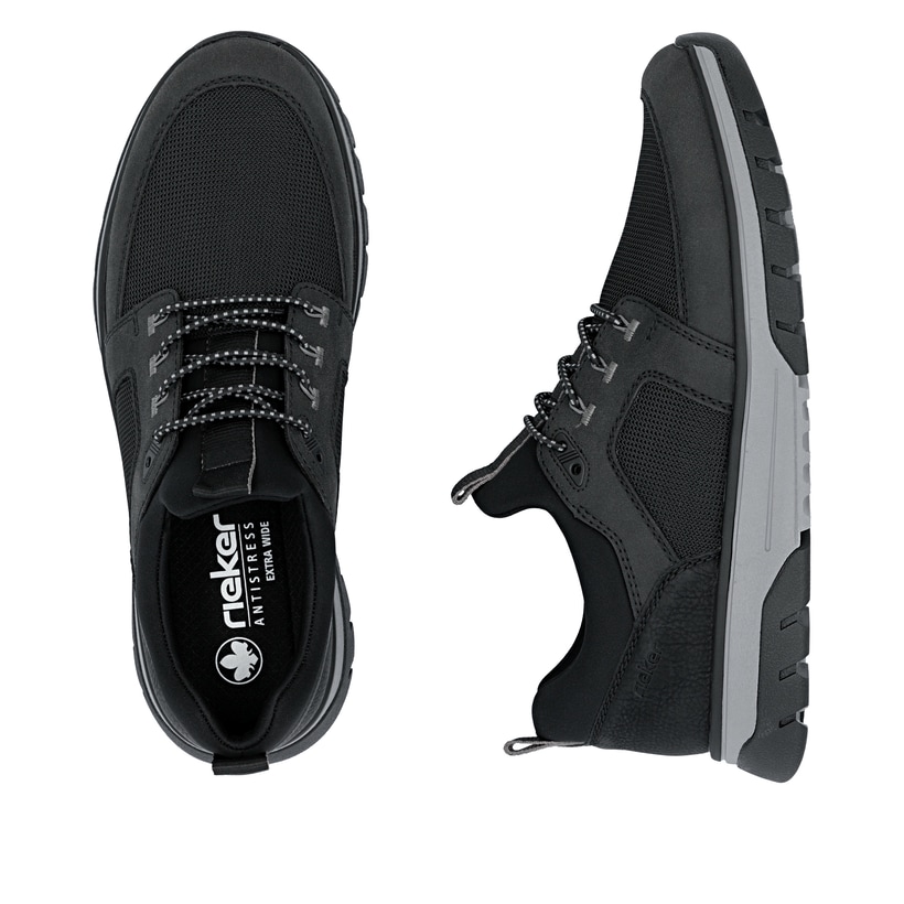 Schwarzgraue Rieker Herren Slipper B9351-00 mit Gummizug sowie der Extraweite H. Schuh von oben, liegend.