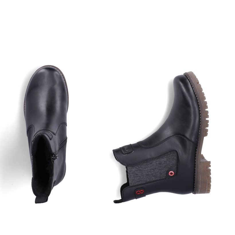 Schwarze Rieker Damen Chelsea Boots 79561-00 mit einem Reißverschluss. Schuh von oben, liegend.