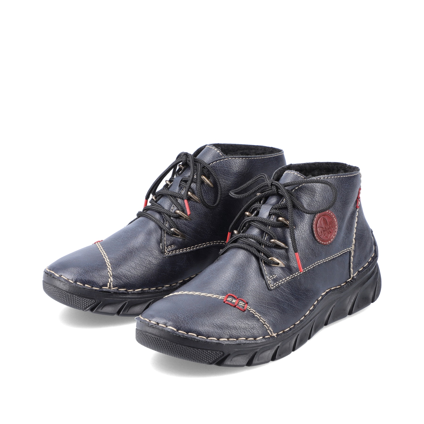 Marineblaue Rieker Damen Schnürschuhe 55002-14 mit einer sehr leichten Sohle. Schuhpaar schräg.