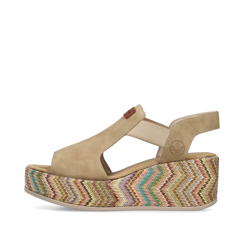 Beige Rieker Keilsandaletten 69472-60 mit Gummizug sowie leichter Plateausohle. Schuh Außenseite.