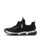Mocassins Rieker noirs pour femme 45973-00 avec bande élastique. Côté extérieur de la chaussure.