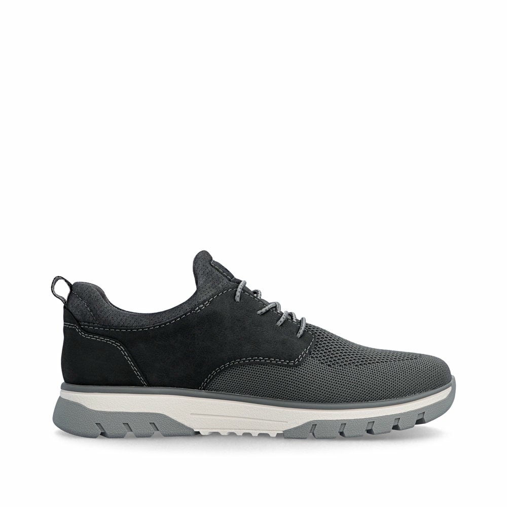Schwarze Rieker Herren Slipper B9352-00 mit einem Gummizug sowie Extraweite H. Schuh Innenseite.