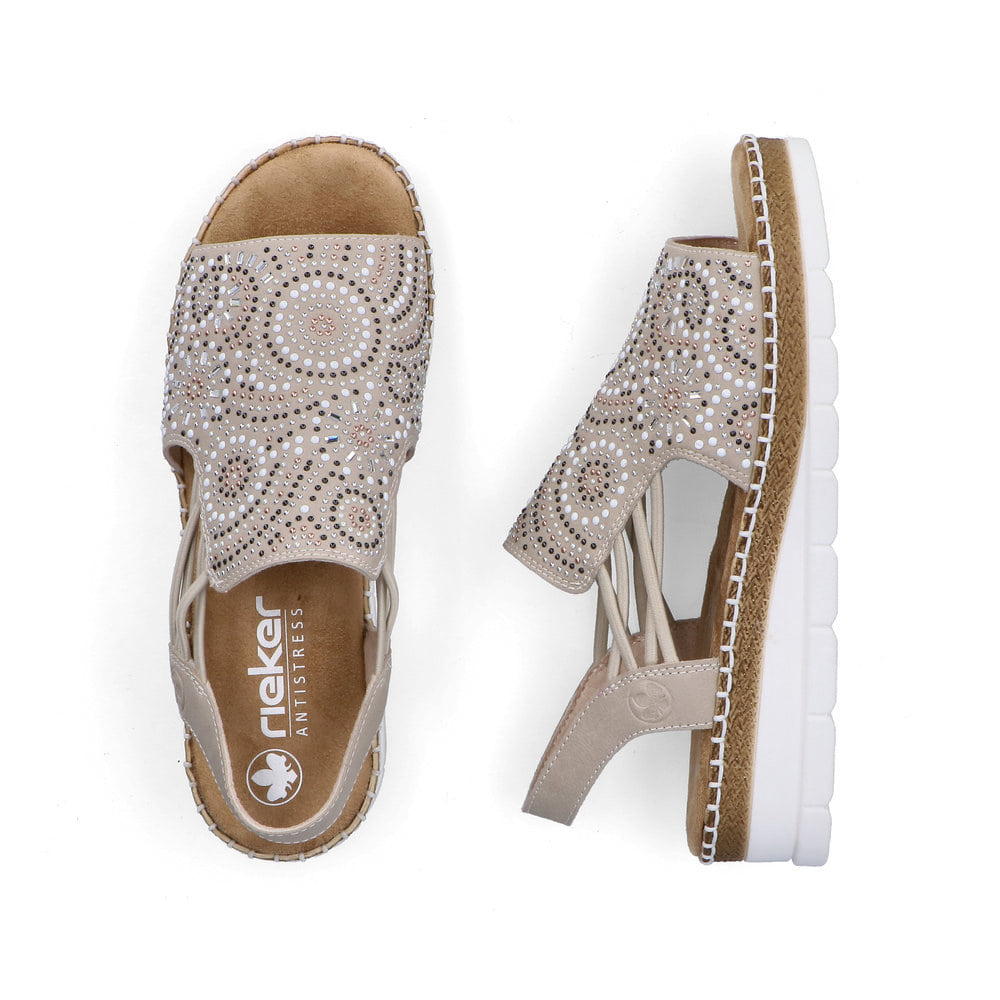 Beige Rieker Damen Sandalen V1246-62 mit Strasssteinen sowie einem Gummizug. Schuh von oben, liegend.