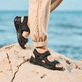 Schwarze vegane Rieker Damen Trekkingsandalen 67666-00 mit Rieker Air. Schuh am Model. 