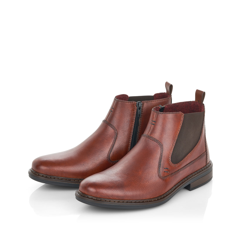 Kaffeebraune Rieker Herren Chelsea Boots 37662-24 mit einem Reißverschluss. Schuhpaar seitlich schräg.