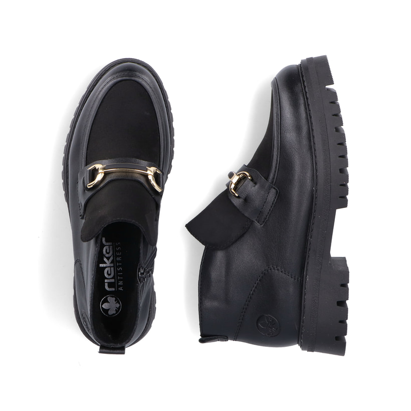 Schwarze Rieker Damen Kurzstiefel 47582-00 mit Deko-Kette sowie Reißverschluss. Schuh von oben, liegend.