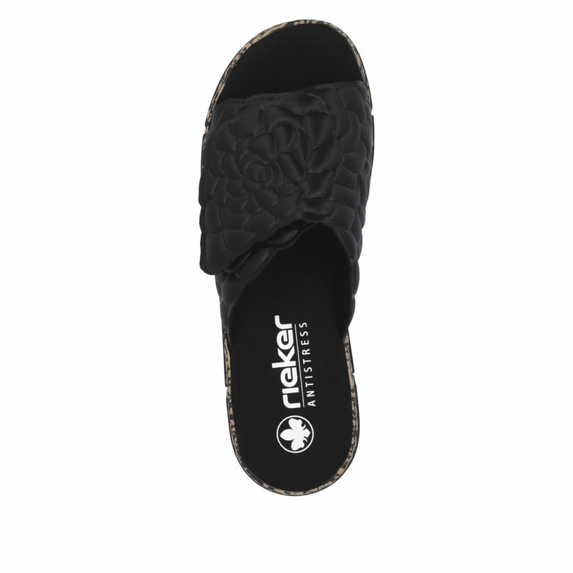 Schwarze Rieker Damen Pantoletten V2351-00 mit floralem Muster. Schuh von oben.