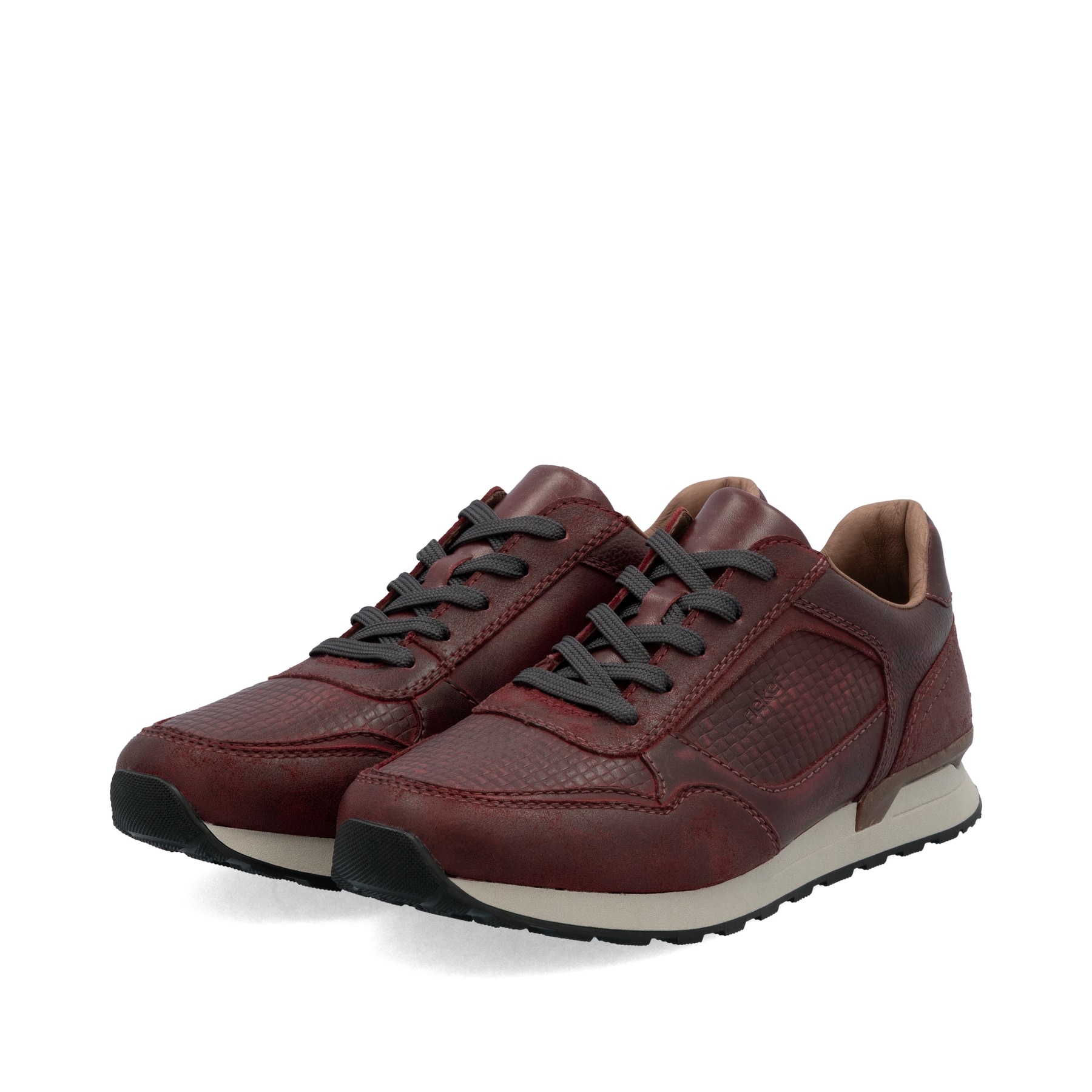Rote Rieker Herren Sneaker Low U0311-35 aus Glattleder mit einer Schnürung. Schuhpaar seitlich schräg.